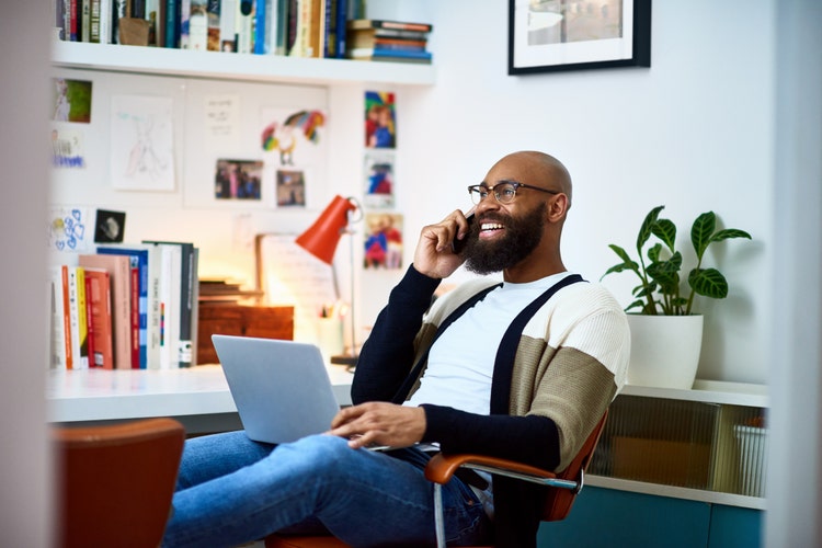 Businessman working from home on phone