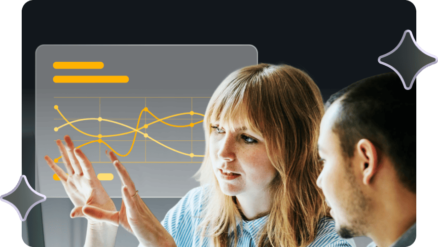 A woman and a man discuss data, focusing on an overlay of colorful line graphs. The scene conveys collaboration and analytical engagement.