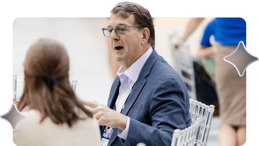 Attendee sharing their experience at Spend Connect