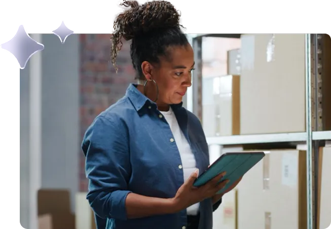 Portrait of a Successful Employee Checking Inventory, Writing in Tablet Computer. Black Woman Posing for Camera and Smiling in a Warehouse Storeroom with Orders Ready for Shipment. - stock video