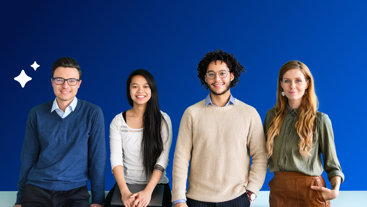 Four colleagues standing side by side