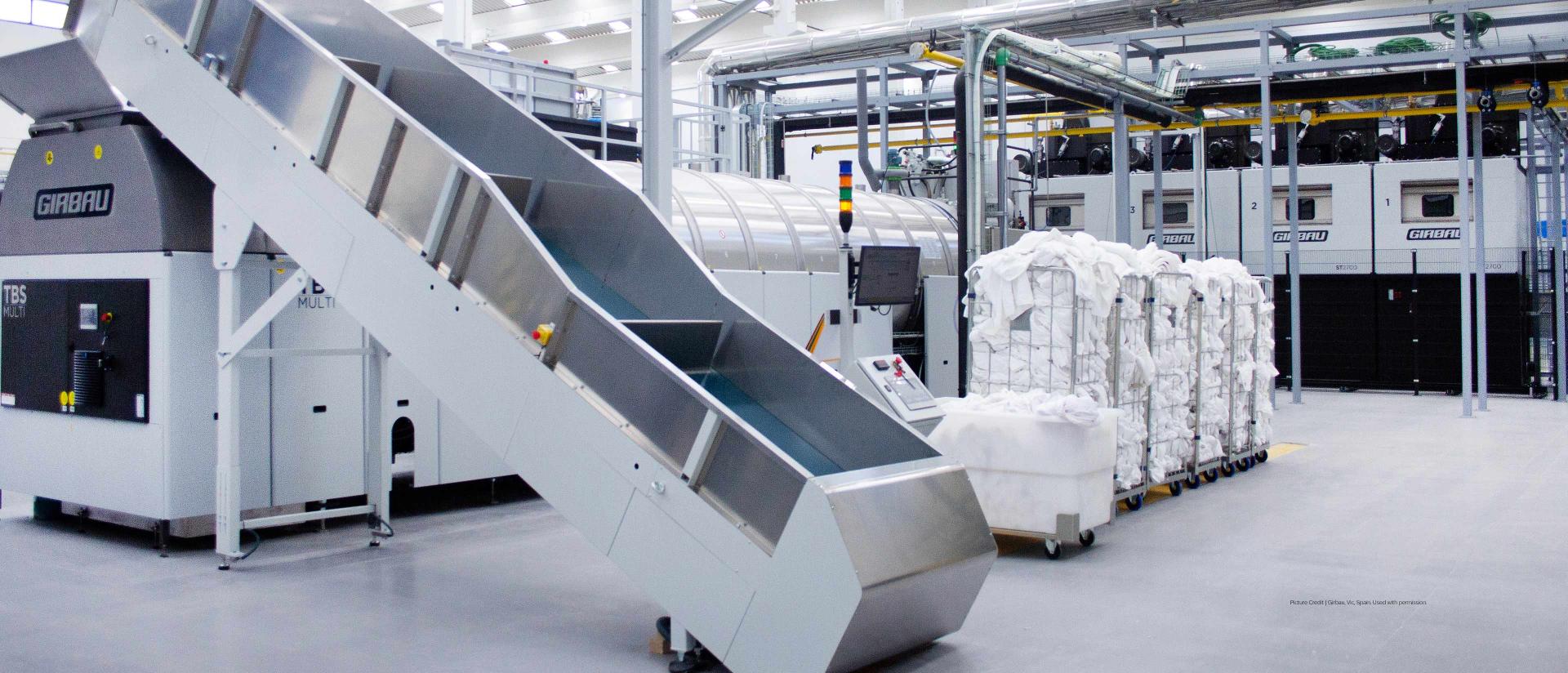Industrial cleaning facility for sheets and towels