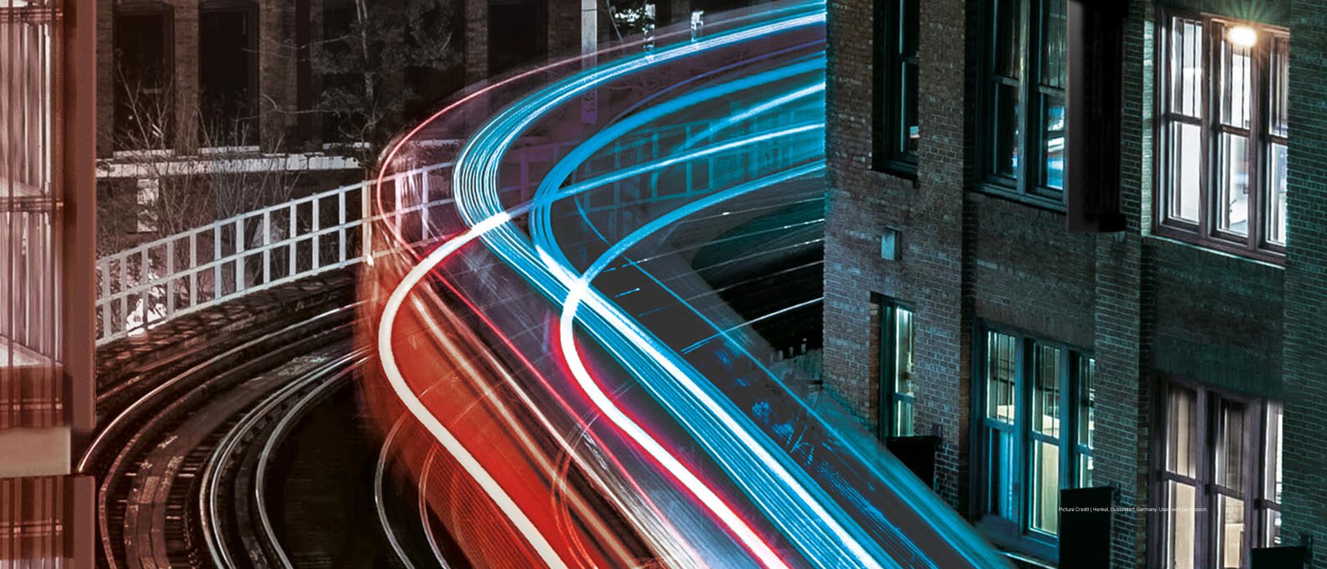 Train at night through the city