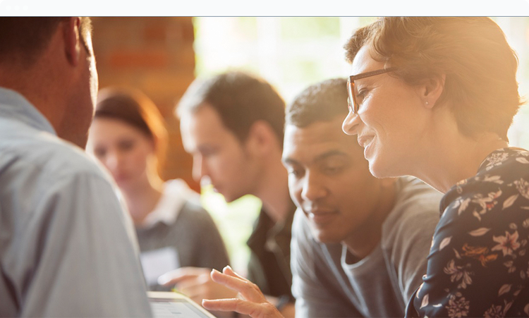 Image is showing a group of people are in the midst of the discussion