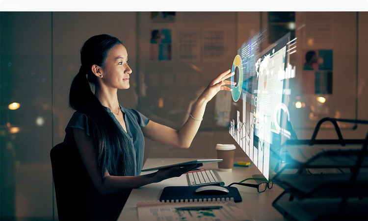 Woman sitting in front of computer