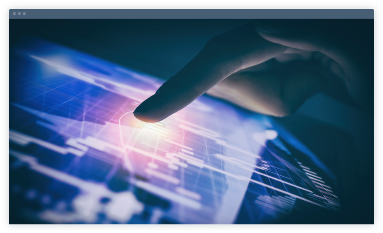 A finger touching a tablet to illuminate part of the screen.