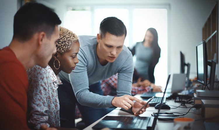 Mobile app developers at the office