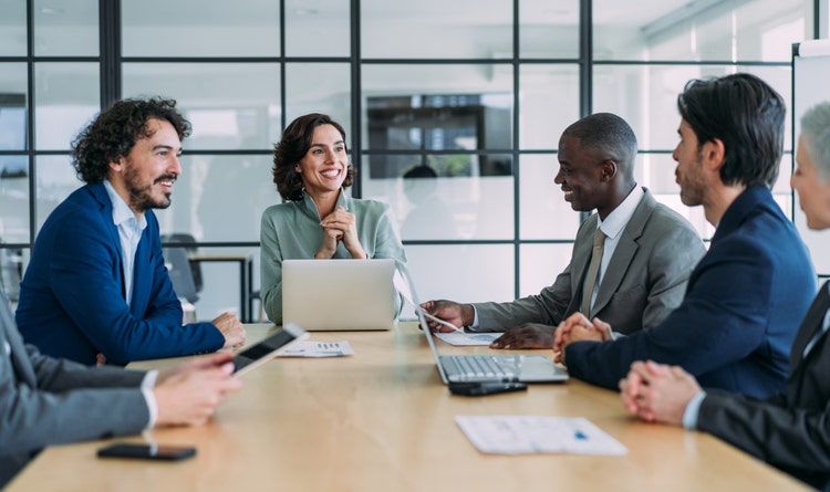 work colleagues in a business meeting